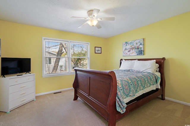 508-B Rosemary Ln, North Myrtle Beach, SC 29582 - bedroom featuring light colored carpet, baseboards, and ceiling fan