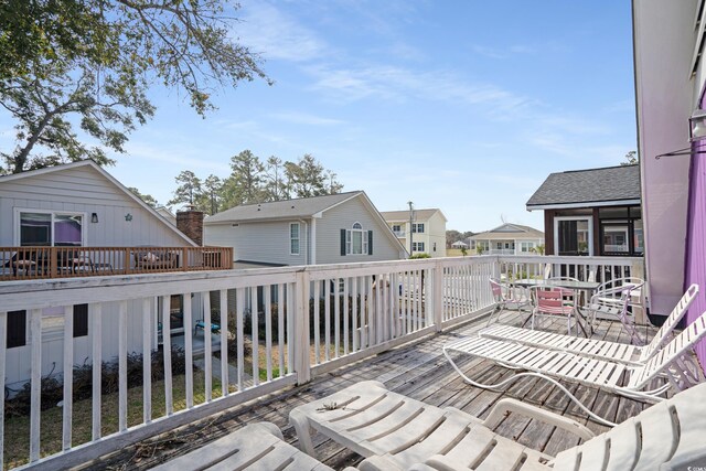508-B Rosemary Ln, North Myrtle Beach, SC 29582 - deck featuring outdoor dining area and a residential view