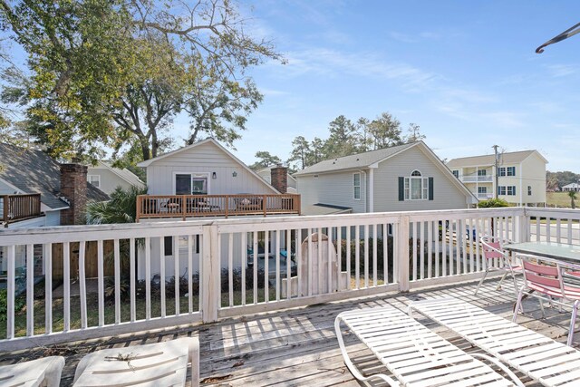 508-B Rosemary Ln, North Myrtle Beach, SC 29582 - wooden deck featuring a residential view
