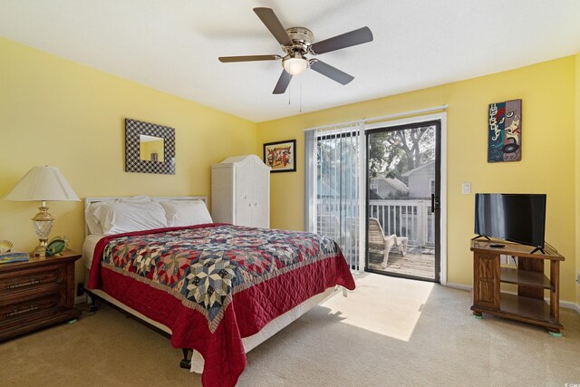 508-B Rosemary Ln, North Myrtle Beach, SC 29582 - bedroom with access to exterior, carpet, a ceiling fan, and baseboards