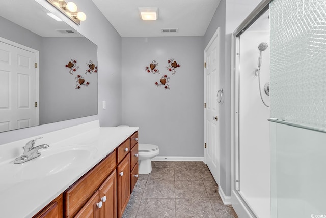 full bathroom with a shower stall, vanity, visible vents, and baseboards