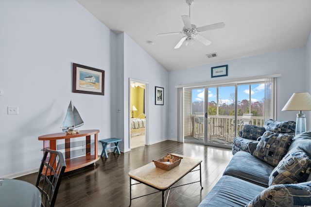 living room featuring a ceiling fan, wood finished floors, visible vents, and baseboards