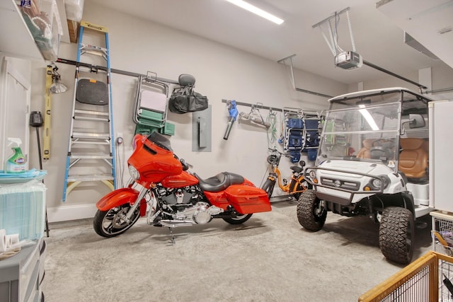 622 Lorenzo Dr Unit 622, North Myrtle Beach, SC 29582 - garage featuring a garage door opener and electric panel