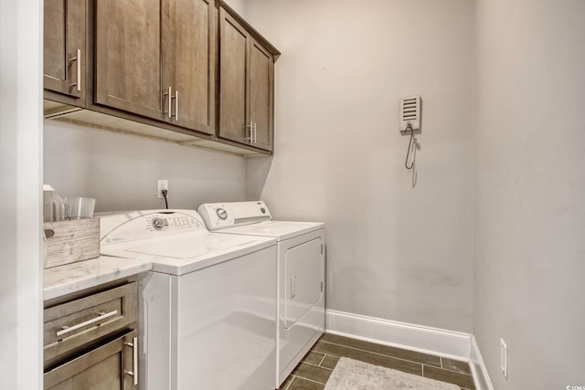 622 Lorenzo Dr Unit 622, North Myrtle Beach, SC 29582 - washroom featuring cabinet space, washing machine and dryer, and dark wood-style flooring