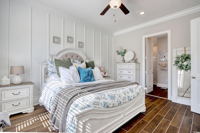622 Lorenzo Dr Unit 622, North Myrtle Beach, SC 29582 - bedroom featuring crown molding, dark wood-style floors, ensuite bath, and a ceiling fan