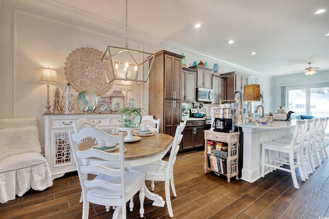 622 Lorenzo Dr Unit 622, North Myrtle Beach, SC 29582 - dining area with dark wood-style floors, ornamental molding, a chandelier, recessed lighting, and ceiling fan