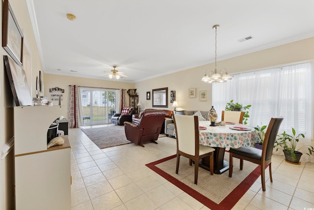4142 Hibiscus Dr Unit 104, Little River, SC 29566 - dining space featuring light tile patterned floors, a chandelier, crown molding, and a ceiling fan