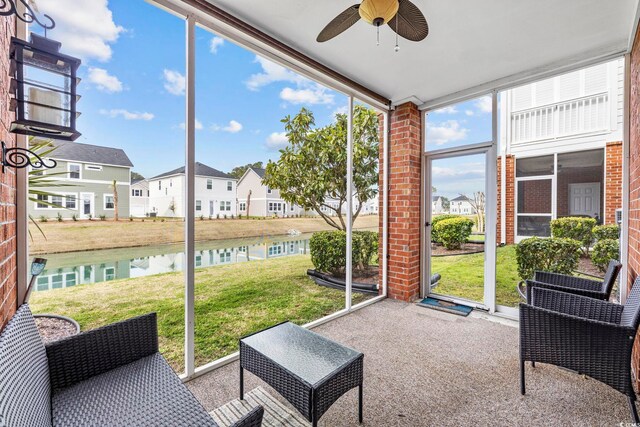 4142 Hibiscus Dr Unit 104, Little River, SC 29566 - sunroom with a water view, a ceiling fan, and a residential view