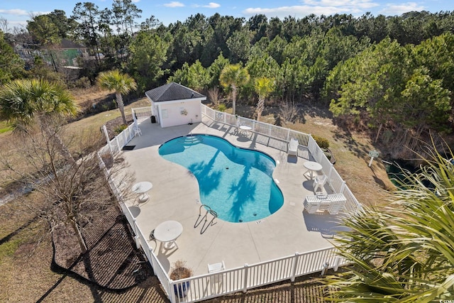 4142 Hibiscus Dr Unit 104, Little River, SC 29566 - community pool with a patio and an outbuilding