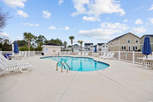 4142 Hibiscus Dr Unit 104, Little River, SC 29566 - community pool featuring a patio area and a residential view