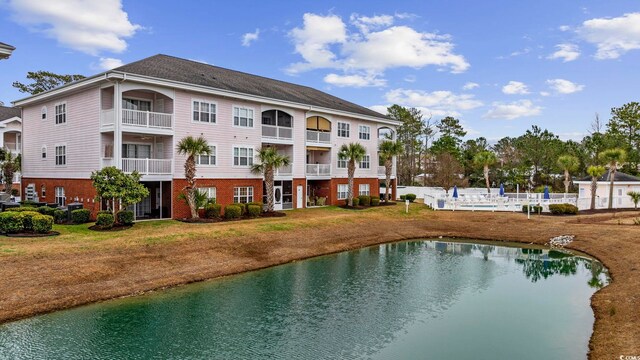 4142 Hibiscus Dr Unit 104, Little River, SC 29566 - view of swimming pool with a water view