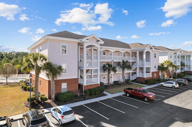 4142 Hibiscus Dr Unit 104, Little River, SC 29566 - view of property featuring uncovered parking