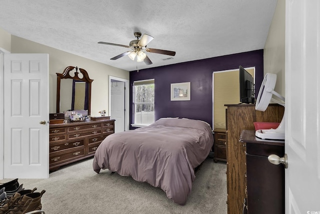 248 Upper Saddle Cir, Conway, SC 29526 - carpeted bedroom with a textured ceiling and a ceiling fan