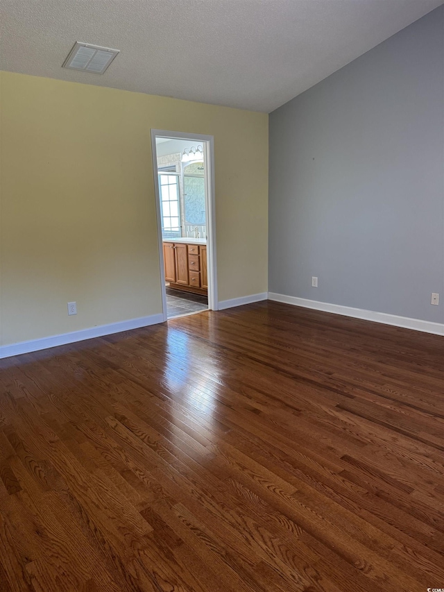 1205 Woodruff Ct, Conway, SC 29526 - empty room featuring dark wood-style flooring and baseboards