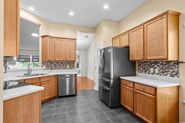 1205 Woodruff Ct, Conway, SC 29526 - kitchen featuring appliances with stainless steel finishes, decorative backsplash, recessed lighting, light countertops, and dark tile patterned flooring