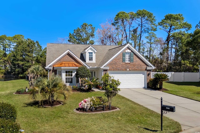 1205 Woodruff Ct, Conway, SC 29526 - traditional-style home featuring driveway, brick siding, a garage, and a shingled roof
