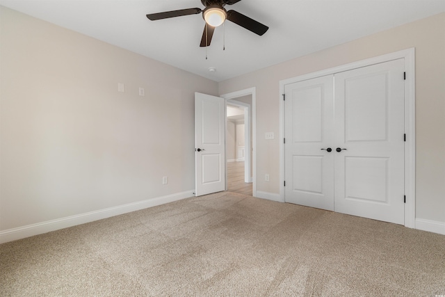 3329 Hughes Gasque Rd, Aynor, SC 29511 - unfurnished bedroom with light carpet, a closet, and a ceiling fan