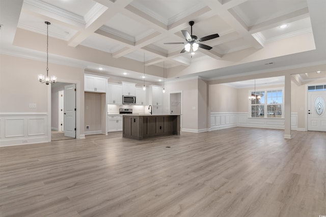 3329 Hughes Gasque Rd, Aynor, SC 29511 - unfurnished living room featuring a chandelier, crown molding, ceiling fan, beam ceiling, and coffered ceiling