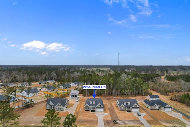 3329 Hughes Gasque Rd, Aynor, SC 29511 - aerial perspective of suburban area featuring a heavily wooded area