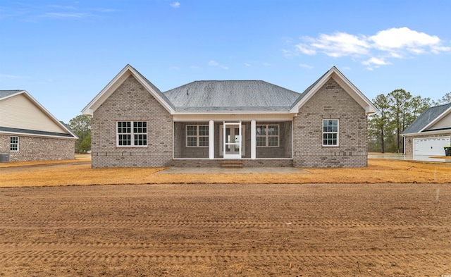3329 Hughes Gasque Rd, Aynor, SC 29511 - back of house with brick siding and french doors