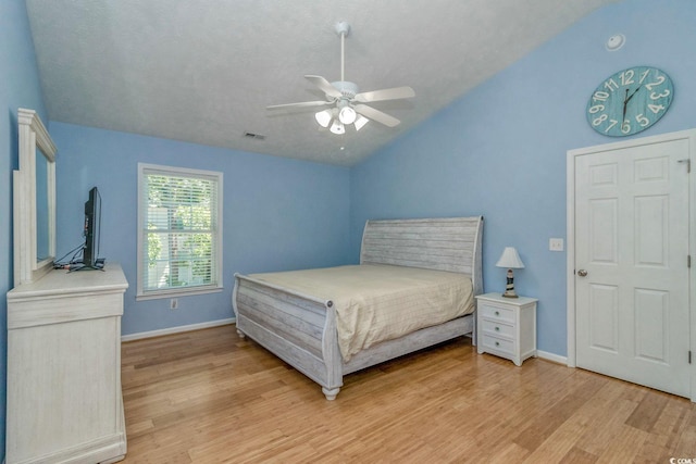 6001-1527 S Kings Hwy, Myrtle Beach, SC 29575 - bedroom with vaulted ceiling, light wood-style floors, and baseboards