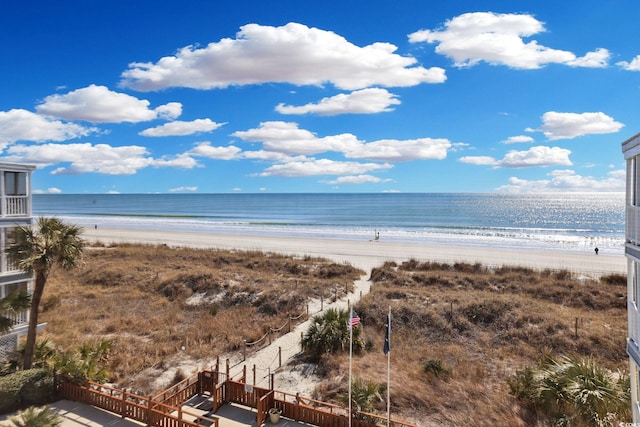 property view of water featuring a beach view