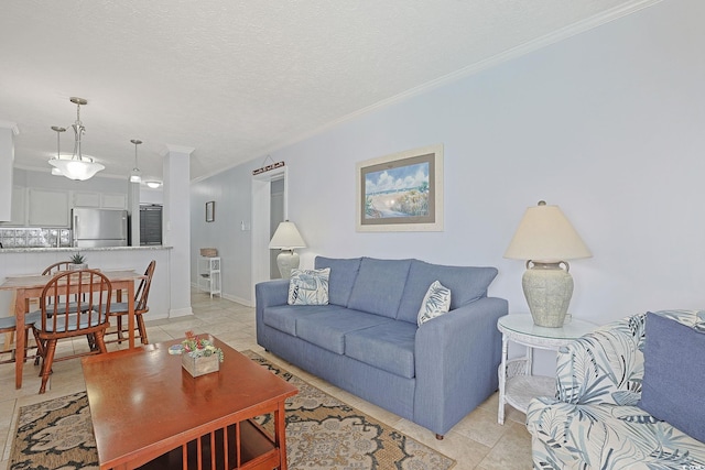 living area with light tile patterned floors, baseboards, a textured ceiling, and crown molding