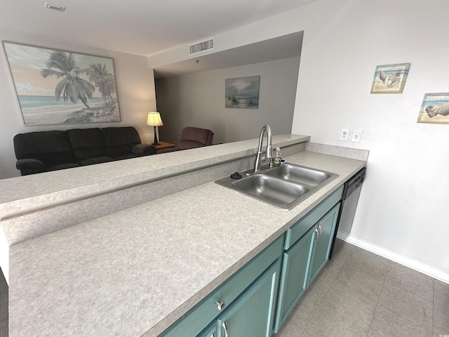 5905 S Kings Hwy Unit 1116, Myrtle Beach, SC 29575 - kitchen featuring visible vents, a sink, open floor plan, light countertops, and baseboards