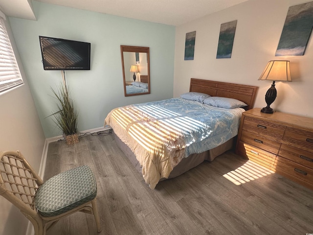 5905 S Kings Hwy Unit 1116, Myrtle Beach, SC 29575 - bedroom with baseboards and wood finished floors