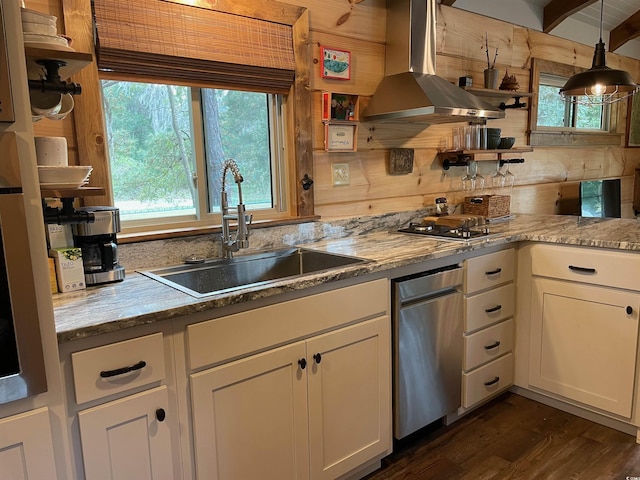 kitchen featuring a sink, white cabinets, extractor fan, and open shelves