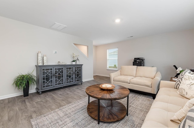 4484 E Coast Ln, Shallotte, NC 28470 - living area featuring wood finished floors and baseboards