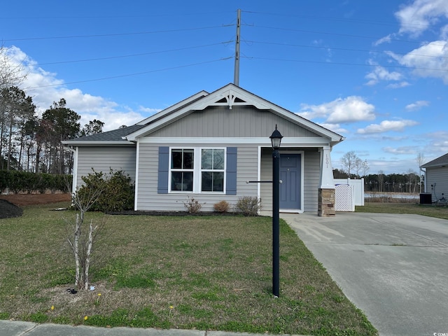 1001 Leatherman Rd, Conway, SC 29527 - view of front facade with a front lawn, driveway, and central AC