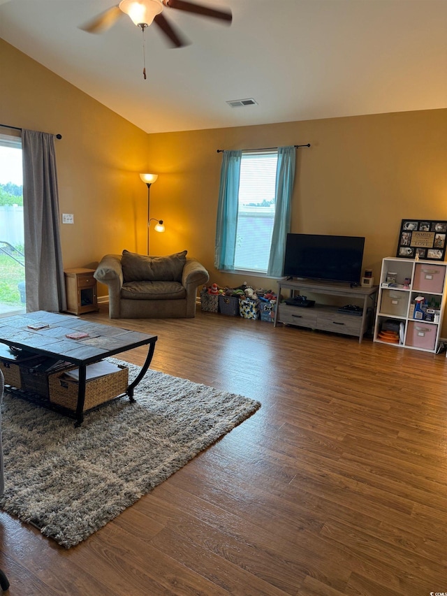 1001 Leatherman Rd, Conway, SC 29527 - living area featuring lofted ceiling, healthy amount of natural light, a ceiling fan, and wood finished floors