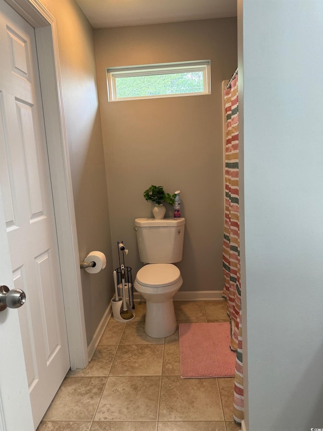 1001 Leatherman Rd, Conway, SC 29527 - full bath featuring toilet, tile patterned flooring, baseboards, and a shower with curtain