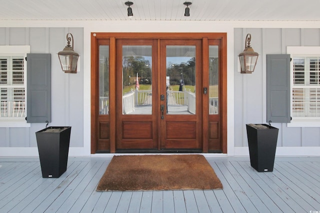 2425 S Bay St, Georgetown, SC 29440 - doorway to property featuring french doors, covered porch, and board and batten siding