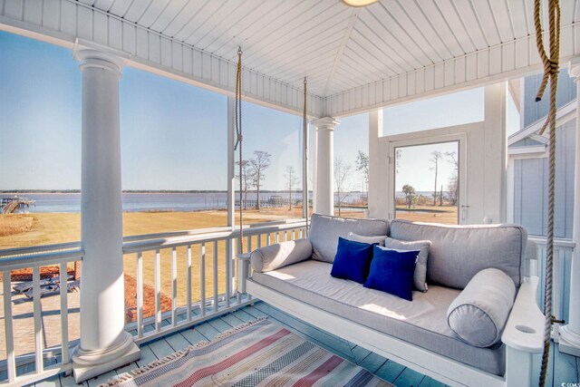 2425 S Bay St, Georgetown, SC 29440 - sunroom featuring a water view and an outdoor living space