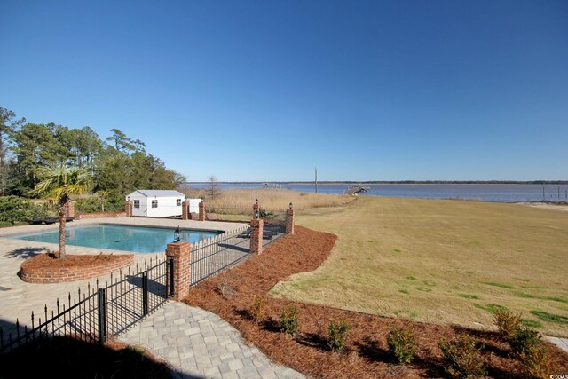 2425 S Bay St, Georgetown, SC 29440 - view of pool featuring an outbuilding and a water view