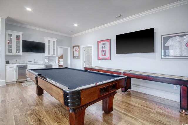 2425 S Bay St, Georgetown, SC 29440 - rec room featuring wet bar, crown molding, billiards table, light wood-type flooring, and recessed lighting