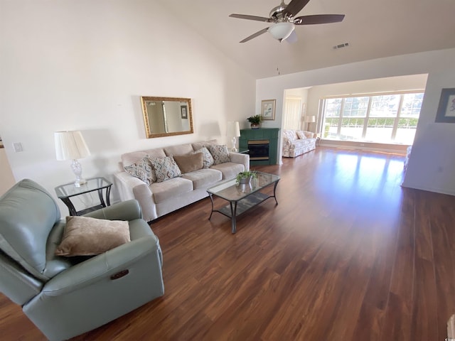1435 Southwood Dr, Myrtle Beach, SC 29575 - living room featuring dark wood-style floors, high vaulted ceiling, a ceiling fan, and visible vents