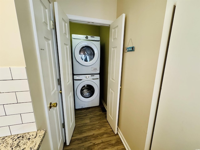 6001-G5 S Kings Hwy, Myrtle Beach, SC 29575 - laundry area featuring stacked washer / drying machine and dark wood-style floors