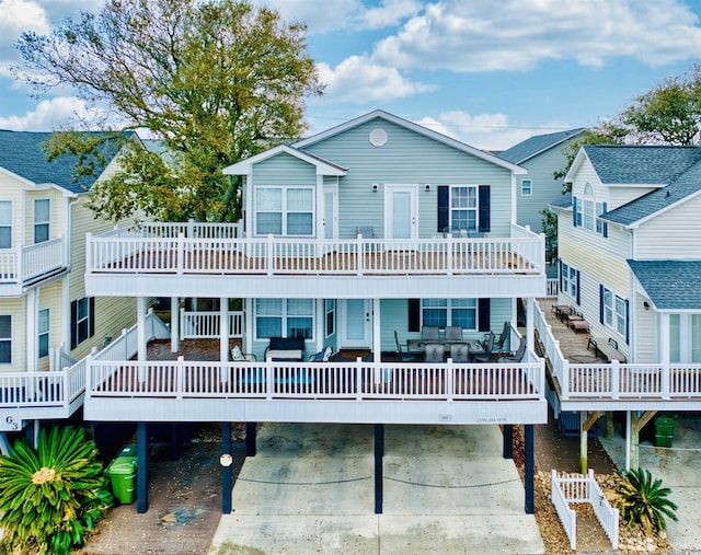 6001-G5 S Kings Hwy, Myrtle Beach, SC 29575 - view of front of house with an outdoor hangout area and a deck