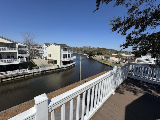 6001-G5 S Kings Hwy, Myrtle Beach, SC 29575 - dock area featuring a water view and a residential view