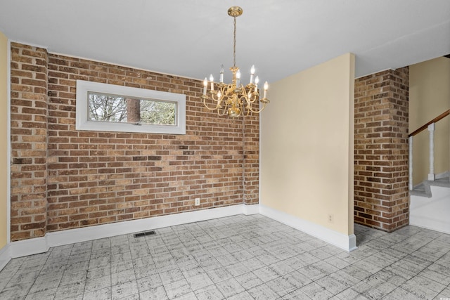 5616 N Kings Hwy, Myrtle Beach, SC 29577 - spare room with stairs, baseboards, a chandelier, and brick wall
