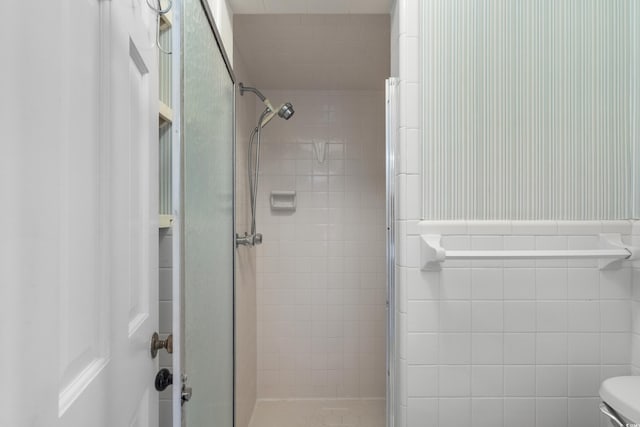 5616 N Kings Hwy, Myrtle Beach, SC 29577 - bathroom featuring a stall shower and toilet