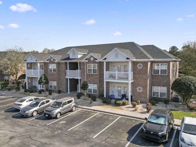 2081 Silvercrest Dr Unit G, Myrtle Beach, SC 29579 - view of building exterior featuring uncovered parking and central air condition unit