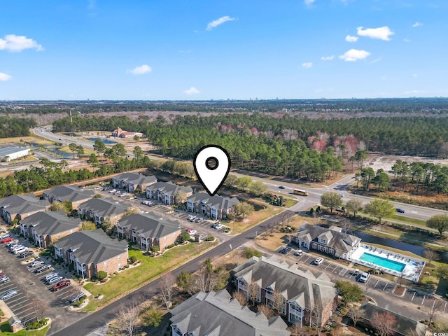 2081 Silvercrest Dr Unit G, Myrtle Beach, SC 29579 - aerial view of property's location with a pool area and a heavily wooded area