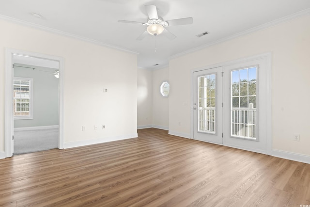 2081 Silvercrest Dr Unit G, Myrtle Beach, SC 29579 - unfurnished room with a ceiling fan, light wood-style flooring, ornamental molding, and baseboards