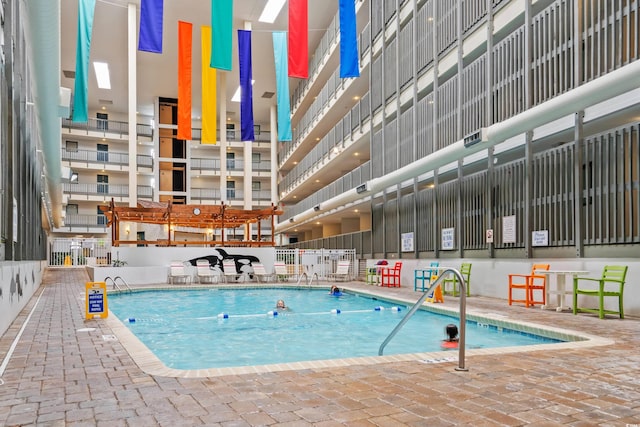 community pool featuring fence