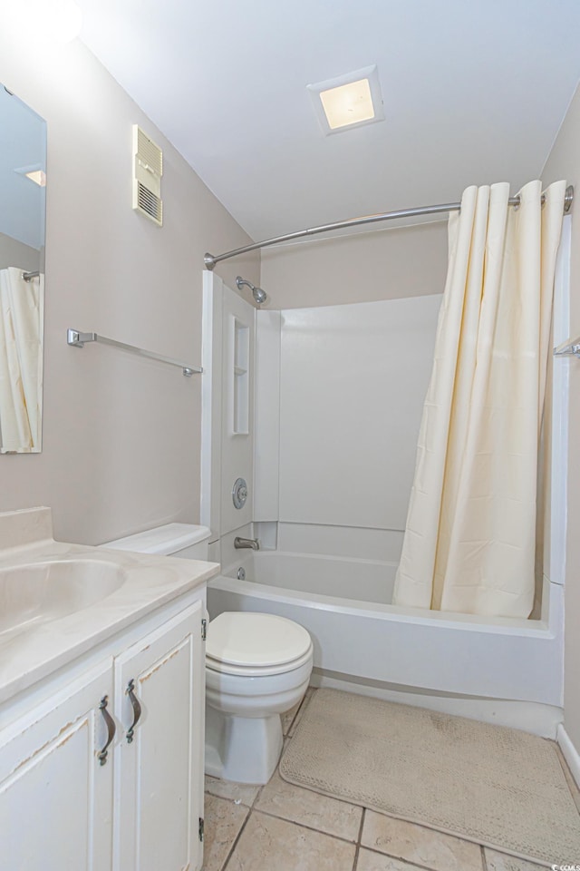full bath featuring shower / tub combo, vanity, toilet, and tile patterned flooring