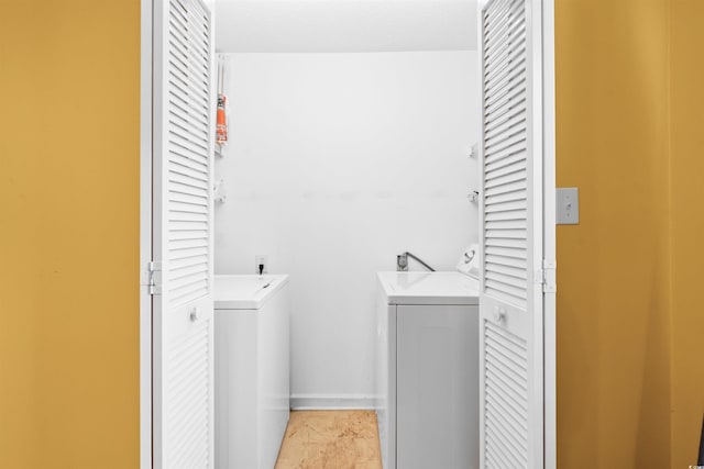 laundry area featuring laundry area and washer and dryer